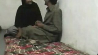 Pakistani couple enjoying sex in their bedroom